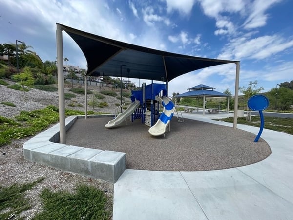 Vacation playground shade structure